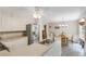 Charming kitchen features stainless steel appliances, white cabinetry, and a breakfast nook for casual dining at 3866 Teresa Sw Ter, Lilburn, GA 30047