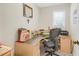 Functional home office with built-in desk, ample storage, and a comfortable workspace at 3866 Teresa Sw Ter, Lilburn, GA 30047