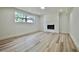 Finished basement featuring a modern fireplace and recessed lighting at 5023 Rockborough Trl, Norcross, GA 30071