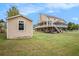 View of the backyard, featuring a tool shed, and expansive outdoor space at 92 River Walk Pkwy, Euharlee, GA 30145