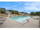 Large community pool with plenty of seating, ideal for summer relaxation and recreation at 92 River Walk Pkwy, Euharlee, GA 30145