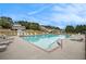 A large community pool with lounge chairs and neighborhood views at 92 River Walk Pkwy, Euharlee, GA 30145