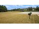Community green space with barbeque grills near the home at 92 River Walk Pkwy, Euharlee, GA 30145