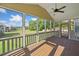 Relaxing screened-in back porch perfect for enjoying the view of the neighborhood at 92 River Walk Pkwy, Euharlee, GA 30145