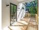 Inviting deck area featuring outdoor access and stylish lighting at 1464 Ezra Church Nw Dr, Atlanta, GA 30314