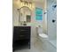 Bathroom featuring white marble shower and matte black hardware at 2228 Carey Se Dr, Atlanta, GA 30315