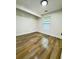Bright and airy bedroom with vinyl wood floors and lots of natural light from a window at 2228 Carey Se Dr, Atlanta, GA 30315