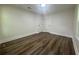Bedroom featuring hardwood floors, recessed lighting, baseboard trim and a window view to the outdoors at 2228 Carey Se Dr, Atlanta, GA 30315