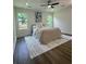 Brightly lit bedroom offers a decorative area rug and a large window at 2228 Carey Se Dr, Atlanta, GA 30315