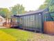Inviting home with covered deck, landscaping, and wood fence at 2228 Carey Se Dr, Atlanta, GA 30315