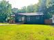 Charming home featuring a well-kept lawn and modern design elements at 2228 Carey Se Dr, Atlanta, GA 30315