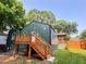 Back of house with a cozy deck and steps leading to the yard at 2228 Carey Se Dr, Atlanta, GA 30315