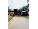 Charming home with a modern design, featuring a covered porch and well-manicured lawn at 2228 Carey Se Dr, Atlanta, GA 30315