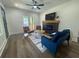 Inviting living area featuring fireplace, modern furniture, and stylish floors at 2228 Carey Se Dr, Atlanta, GA 30315