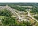 Community aerial showing the property within a well-maintained neighborhood and tree coverage at 2330 Cheatham Creek Ct, Cumming, GA 30040