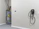 Mechanical Area with hot water heater and electric car charging port at 2330 Cheatham Creek Ct, Cumming, GA 30040