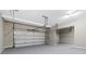 Spacious garage with automatic door and plenty of room for storage and parking at 2330 Cheatham Creek Ct, Cumming, GA 30040
