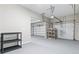 Three-car garage offering plenty of room for parking with additional storage space at 2330 Cheatham Creek Ct, Cumming, GA 30040