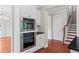 Modern kitchen with stainless steel double oven and granite countertops at 2330 Cheatham Creek Ct, Cumming, GA 30040