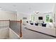 Spacious living room with a cozy seating area, perfect for relaxing and entertaining guests at 2330 Cheatham Creek Ct, Cumming, GA 30040
