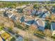Serene aerial view of a suburban neighborhood highlighting the charming houses and tree-lined streets, creating a picturesque community at 3210 Ancoats St, Douglasville, GA 30135