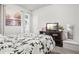 Bedroom featuring soft lighting, neutral tones, and comfortable furnishings at 3210 Ancoats St, Douglasville, GA 30135