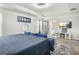 Cozy main bedroom featuring modern decor, tray ceilings, and ample natural light at 3210 Ancoats St, Douglasville, GA 30135