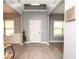 Open foyer with soaring ceilings, hardwood floors, and contemporary decor, offering a spacious feel at 4560 Buckskin Way, Douglasville, GA 30135