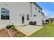 A charming backyard patio area with outdoor seating, accessible from the house, perfect for relaxing and entertaining at 94 Depot Landing Rd, Auburn, GA 30011