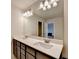 Bathroom features dual sinks, vanity with drawers and cabinets at 94 Depot Landing Rd, Auburn, GA 30011