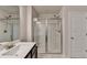 Bathroom featuring shower with glass doors and chrome hardware at 94 Depot Landing Rd, Auburn, GA 30011
