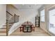 Bright dining area features a rustic wood table, bench seating and access to a patio at 94 Depot Landing Rd, Auburn, GA 30011