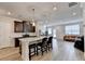 Stylish kitchen with granite island, stainless steel appliances, and an open-concept layout at 94 Depot Landing Rd, Auburn, GA 30011