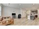 Open-concept living room leading to the kitchen with an island and lots of space at 94 Depot Landing Rd, Auburn, GA 30011