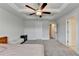 Bright main bedroom with ceiling fan, and neutral tones at 94 Depot Landing Rd, Auburn, GA 30011