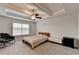 Bright main bedroom with ceiling fan, and neutral tones at 94 Depot Landing Rd, Auburn, GA 30011