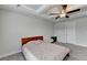 Bright main bedroom with ceiling fan, and neutral tones at 94 Depot Landing Rd, Auburn, GA 30011