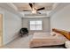 Bright main bedroom with ceiling fan, and neutral tones at 94 Depot Landing Rd, Auburn, GA 30011