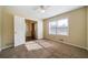 Comfortable bedroom features carpet, a window, a ceiling fan and closet at 120 Paces Lakes Pt, Dallas, GA 30157