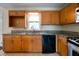 Kitchen features granite countertops, stainless steel appliances, and wooden cabinets at 120 Paces Lakes Pt, Dallas, GA 30157