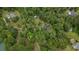 An aerial view of the house, framed by many trees at 1267 Austin Bridge Rd, Douglasville, GA 30134