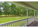 Spacious backyard featuring a manicured lawn and surrounded by lush, mature trees at 1267 Austin Bridge Rd, Douglasville, GA 30134