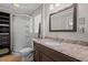 Bathroom featuring shower, tile floor and granite countertops at 1267 Austin Bridge Rd, Douglasville, GA 30134