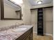 Bathroom featuring a single vanity and closet space at 1267 Austin Bridge Rd, Douglasville, GA 30134
