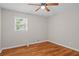 Bedroom featuring hardwood flooring and natural light at 1267 Austin Bridge Rd, Douglasville, GA 30134