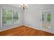 Cozy dining area with views of nature, hardwood floors and natural light at 1267 Austin Bridge Rd, Douglasville, GA 30134