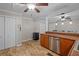 Bright eat-in kitchen with stainless steel appliances and ample cabinet space at 1267 Austin Bridge Rd, Douglasville, GA 30134