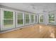 Bright and airy sunroom with abundant natural light and hardwood floors at 1267 Austin Bridge Rd, Douglasville, GA 30134
