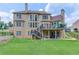 Large two-story home features a sprawling backyard at 1283 Silver Trace Sw Dr, Lilburn, GA 30047