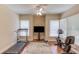Brightly lit home gym with treadmill, exercise bike, and laminate flooring at 1283 Silver Trace Sw Dr, Lilburn, GA 30047